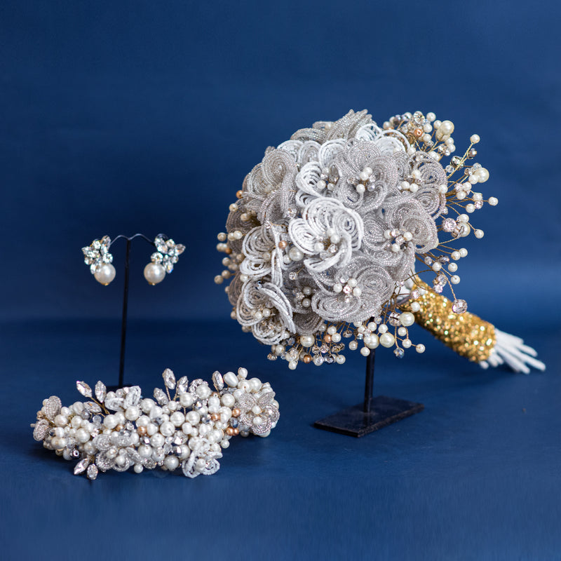 Decorative headpiece with pearls and gold accents 