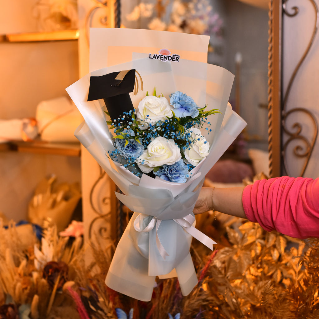 white roses .Artificial Blue Dianthus 
Natural Blue Gypsophila and Artificial Green Leaves