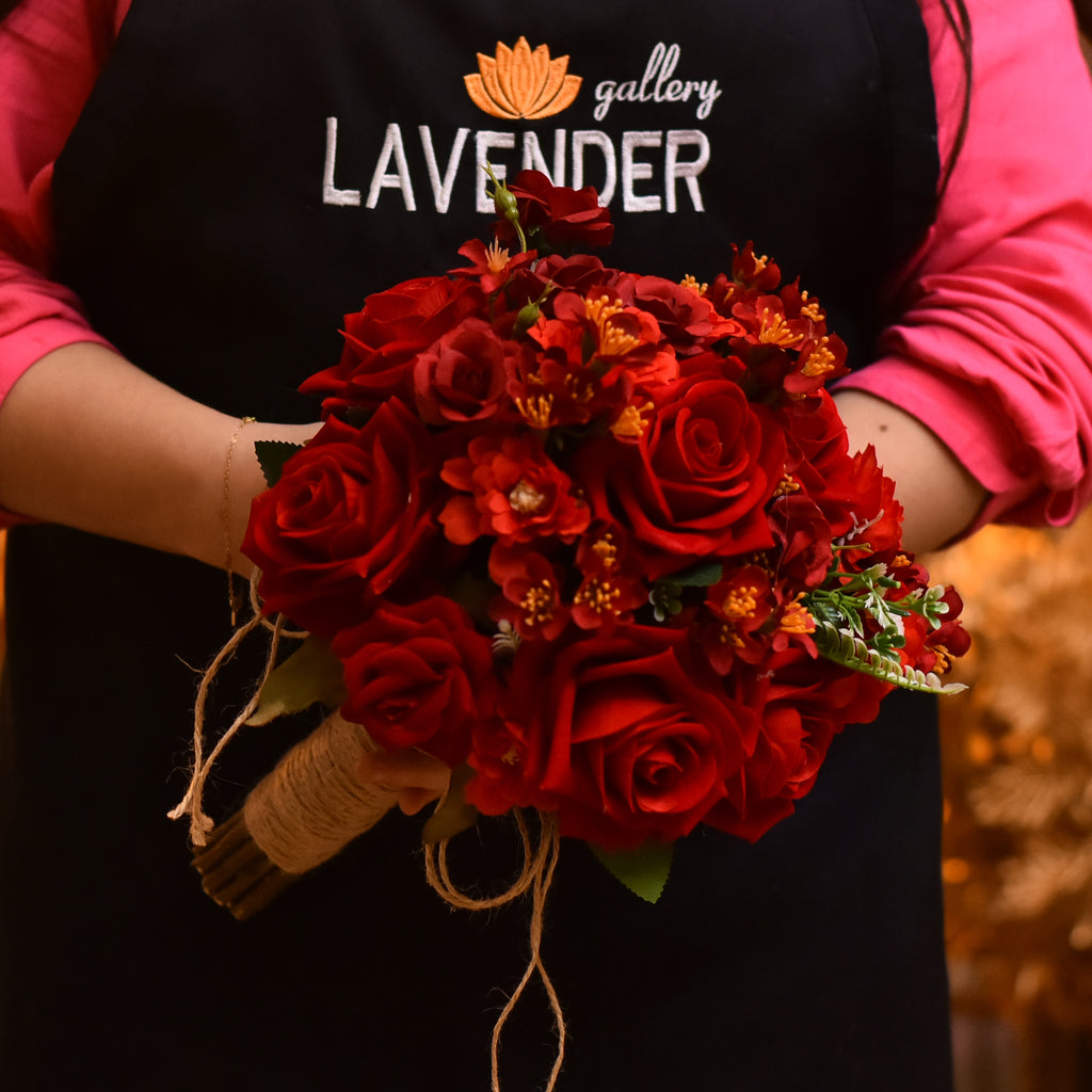 Artificial red roses.Artificial red accessories and Artificial green leaves