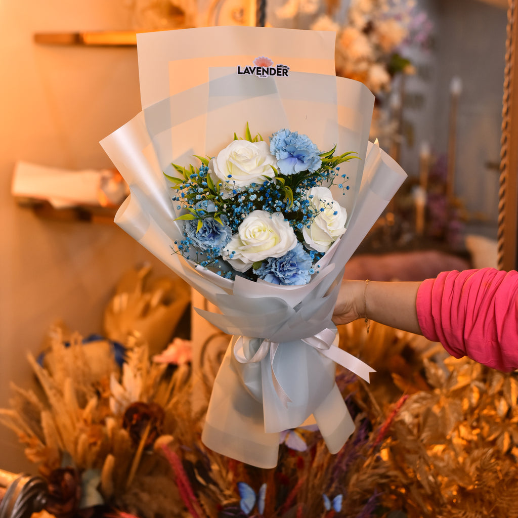 Artificial white roses .Artificial Blue Dianthus. Natural Blue Gypsophila and Artificial Green Leaves