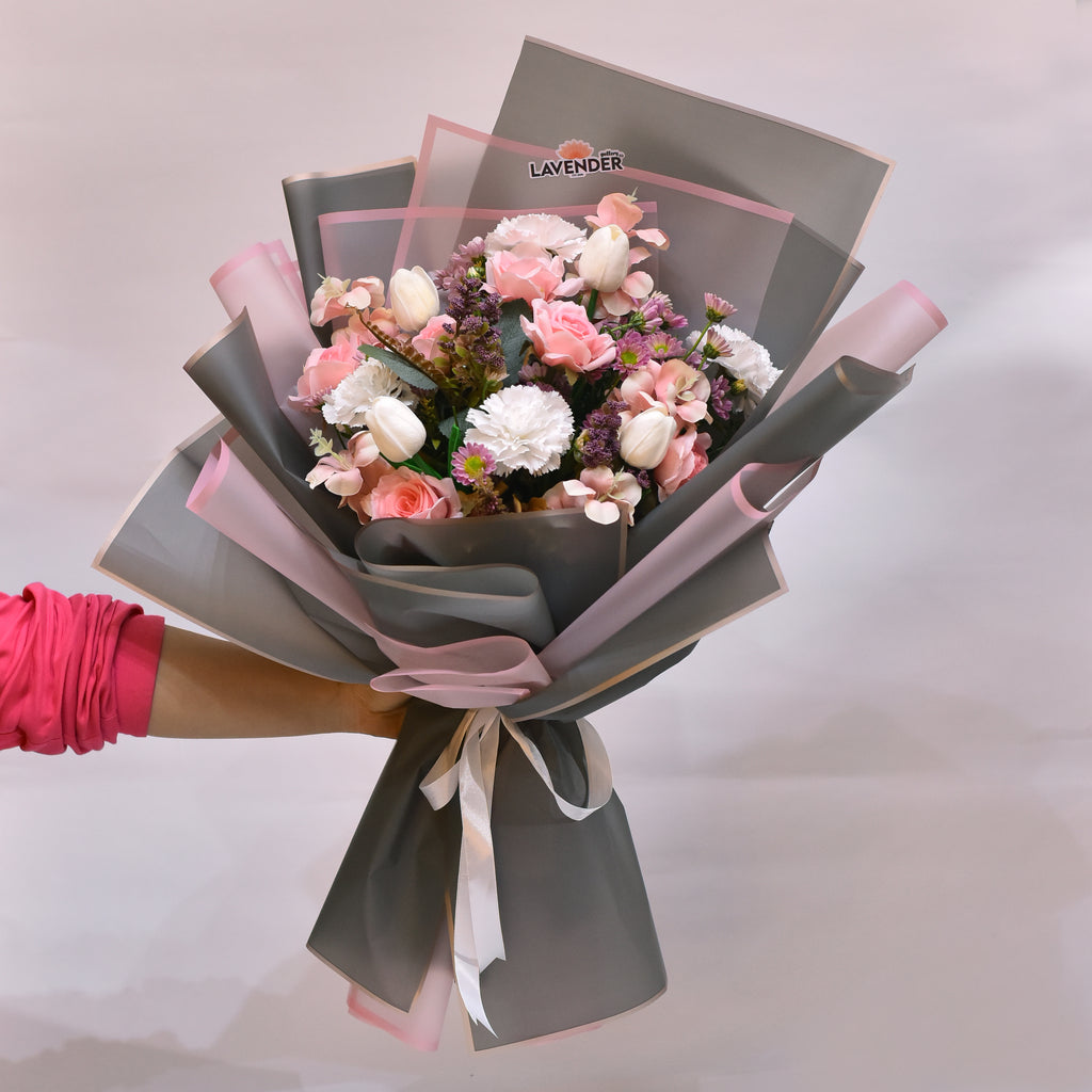 Artificial white tulip.Artificial white carnation .Artificial pink rose.Natural purple chrysanthemum and Artificial pink flower