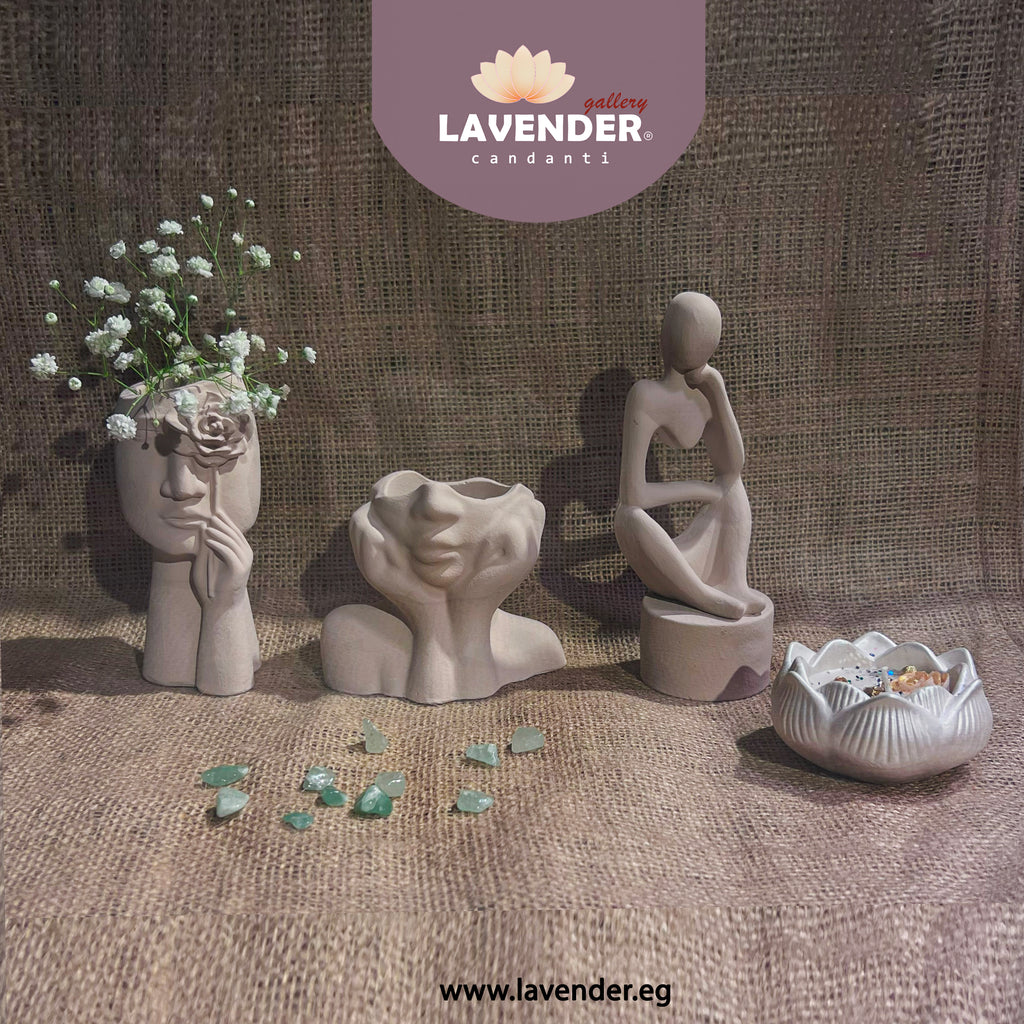 Collection of ceramic sculptures and decorative items 