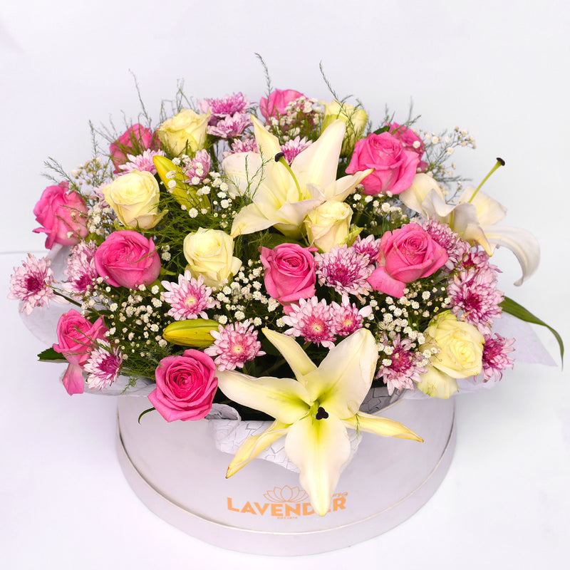 Natural lilies.Natural pink and white  roses .Natural purple chrysanthemum 
Natural whit gypsophila and Natural green leaves