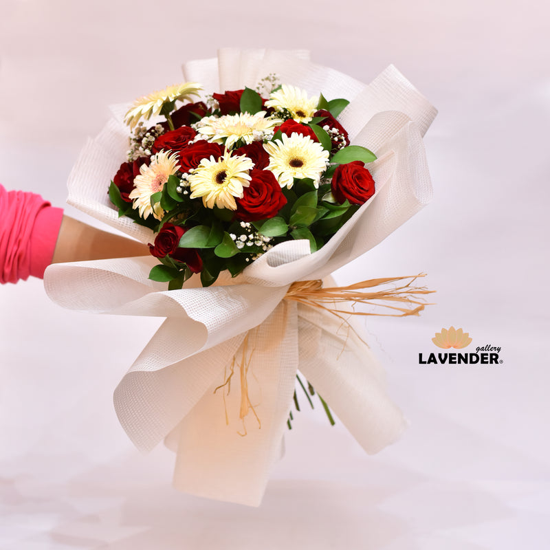 red roses.natural white gerbera .Natural white gypsophila and Natural green leaves