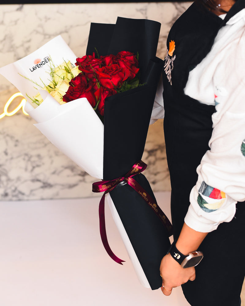 red and white roses and green leaves