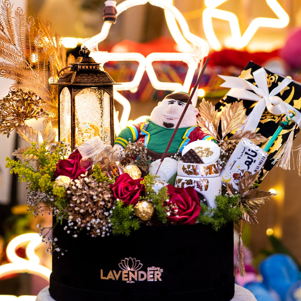 Decorative flower arrangement with plush toys and lantern, featuring the brand 'Lavender'.