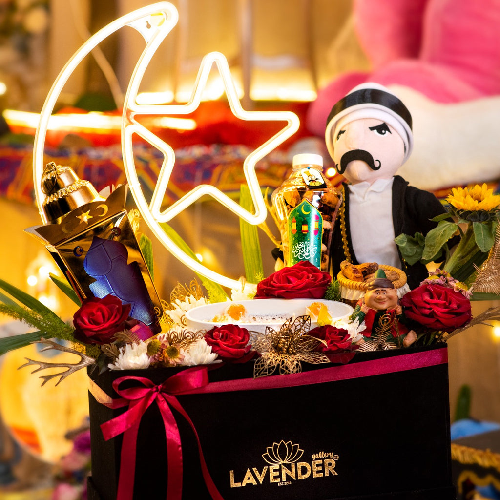 Decorative gift box with flowers, a star-shaped light, and a figurine on a colorful background.